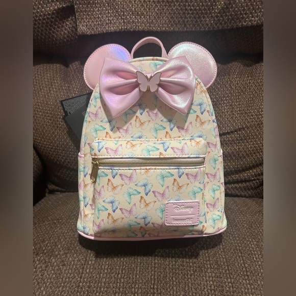Disney Handbags - Disney Loungefly Soft Tag Minnie Mouse Ears Butterfly Mini backpack. NWT.